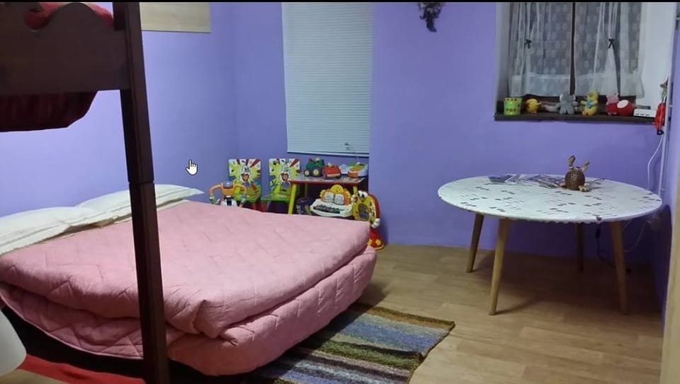 Family Room, Connecting Rooms | Desk, iron/ironing board, bed sheets