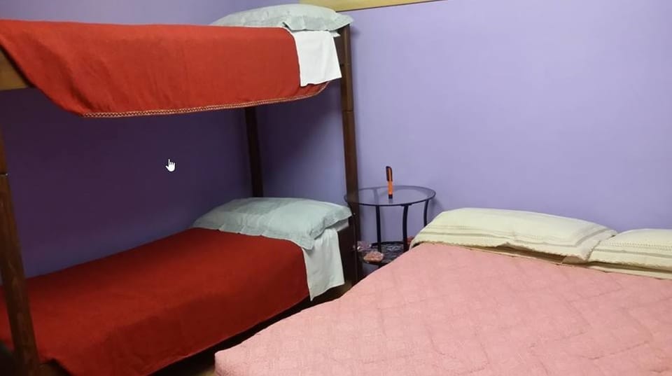 Family Room, Connecting Rooms | Desk, iron/ironing board, bed sheets