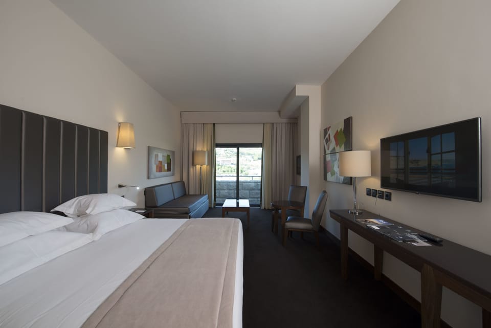 Family Room, River View (2 Adults + 2 Children) | Minibar, in-room safe, desk, soundproofing