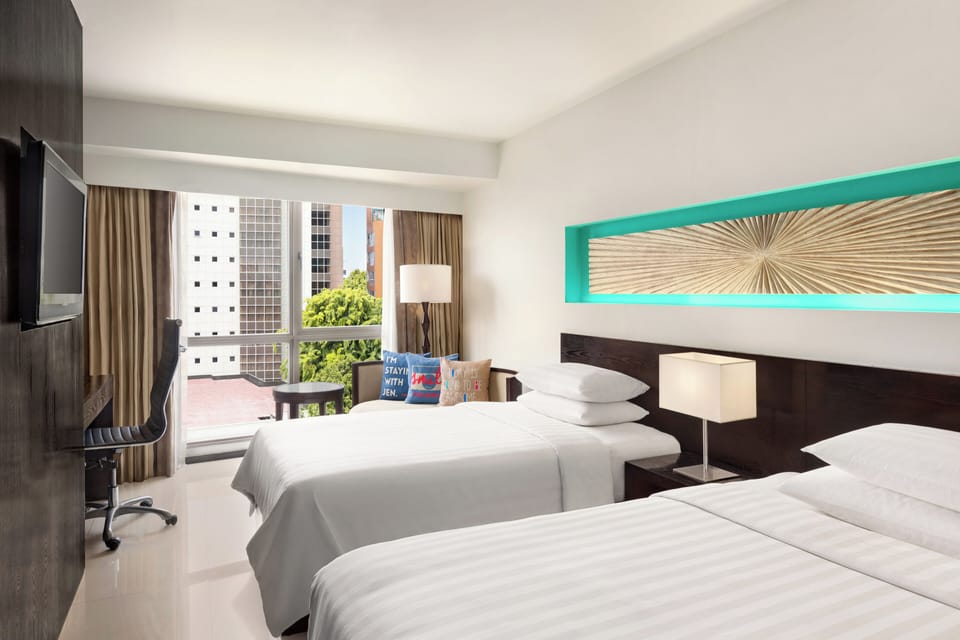 Deluxe Room, 2 Twin Beds | Premium bedding, down comforters, in-room safe, desk