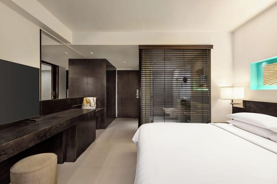 Premium bedding, down comforters, in-room safe, desk