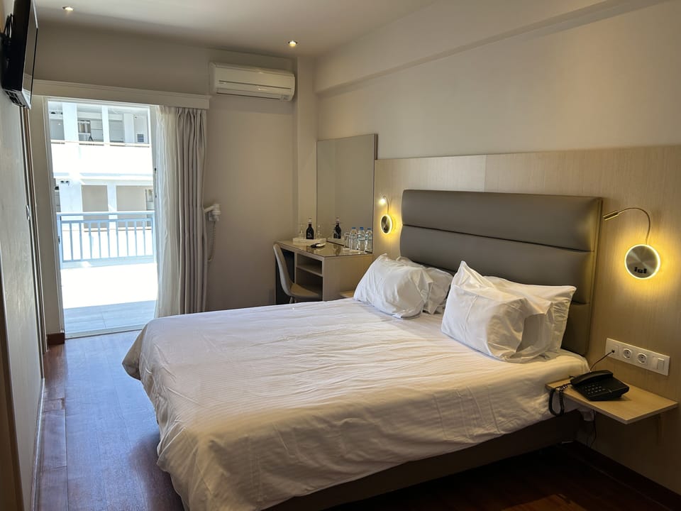 Quadruple Room | Premium bedding, minibar, in-room safe, individually furnished