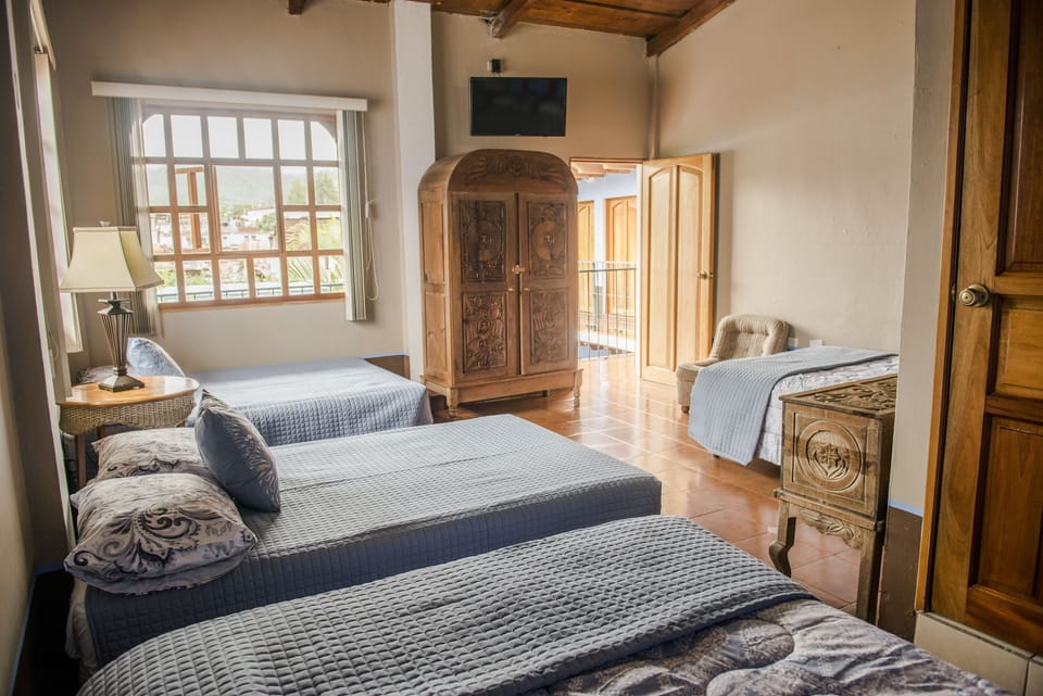 Classic Quadruple Room, Multiple Beds | WiFi (free), bed sheets