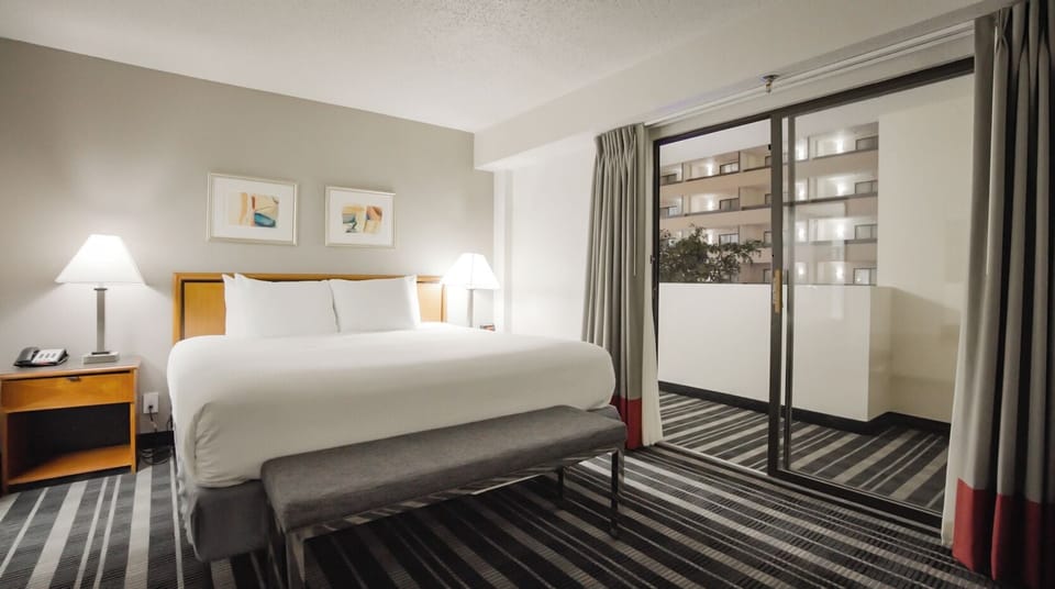 Room, 1 King Bed with Sofa bed | Down comforters, pillowtop beds, in-room safe, desk