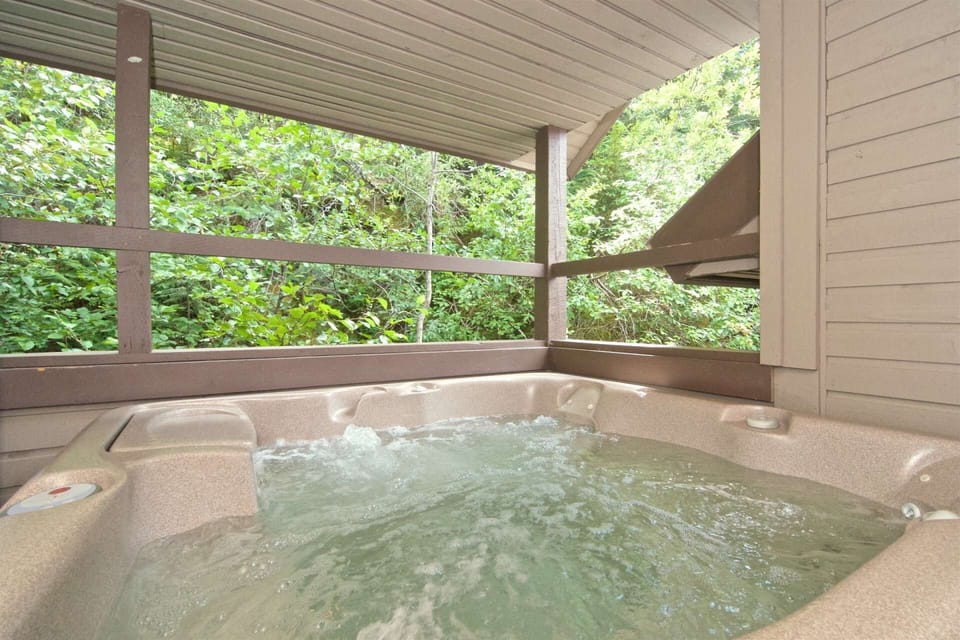 Private HOT TUB on back deck off the bedroom hallway