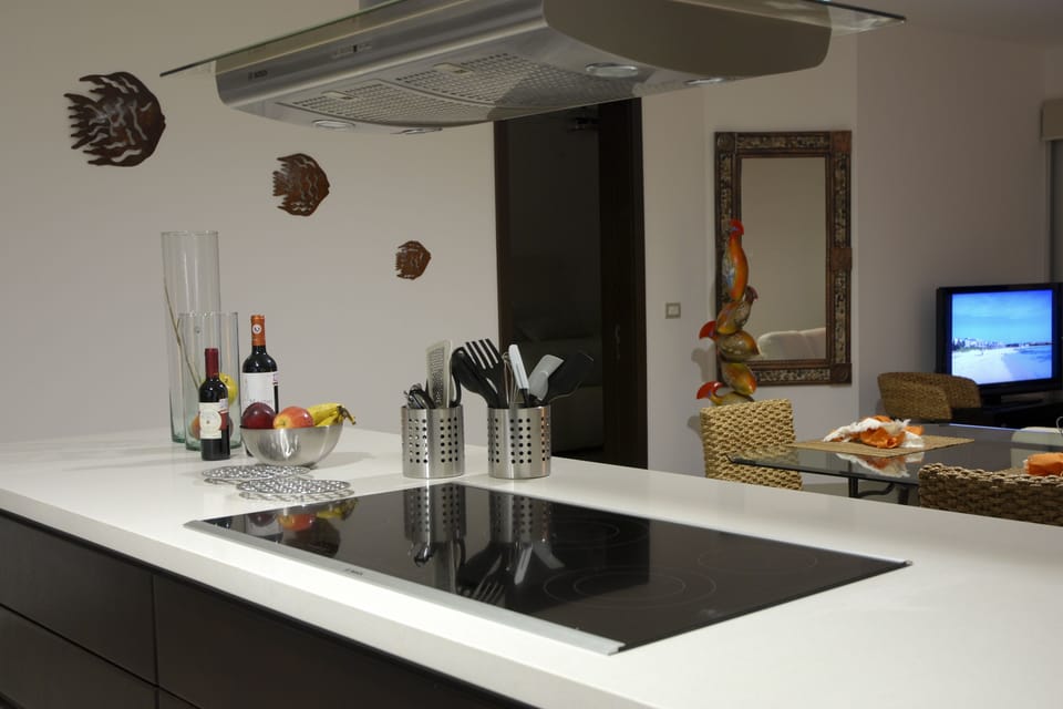 Five Burner Cooktop w/Vent-Dishwasher-Microwave and Oven.  Full set of pots/pans