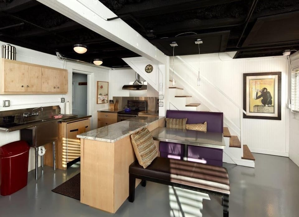 This home offers and industrial chic kitchen and dining area. Guests will have access to all cookware, dining and serving utensils and small appliances needed to prepare and serve meals.