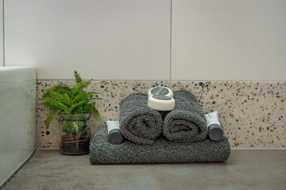 Panoramic Apartment, 1 Bedroom, Ocean View | Bathroom amenities | Shower, rainfall showerhead, hair dryer, towels