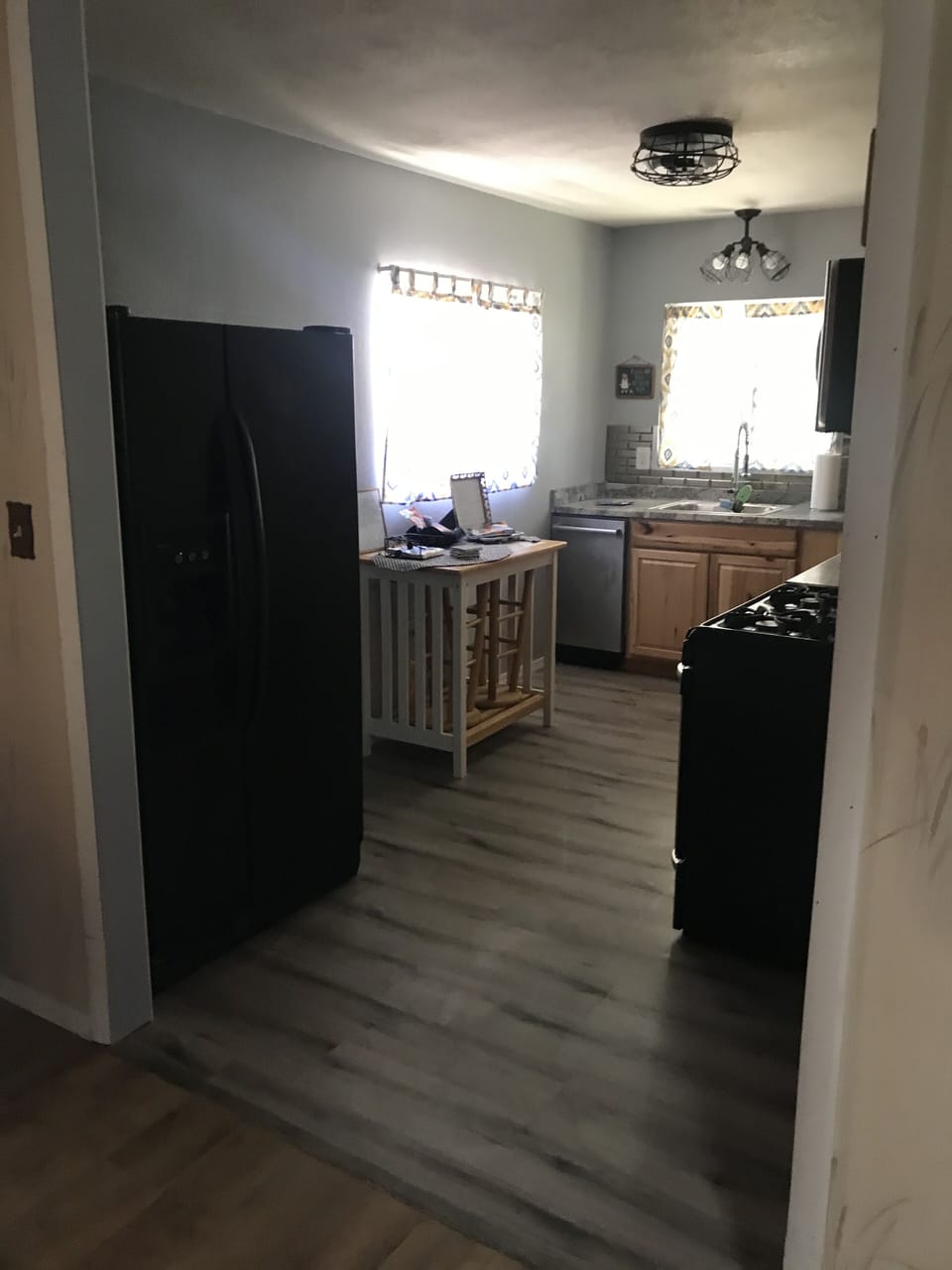 Kitchen view showing full fridge.