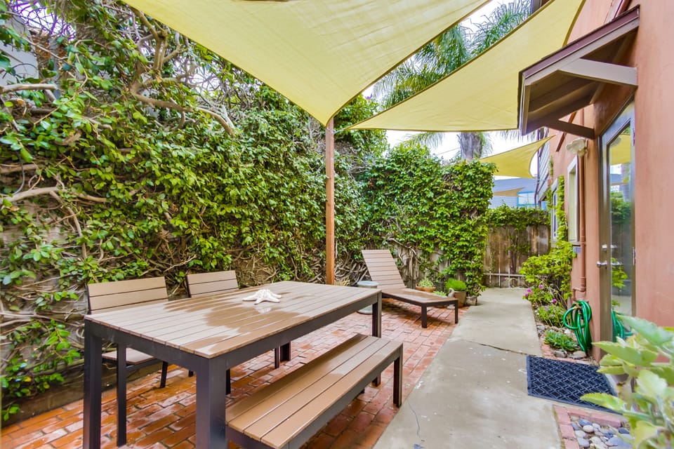 Enclosed private patio is perfect for relaxing, BBQ'ing dining and entertaining!