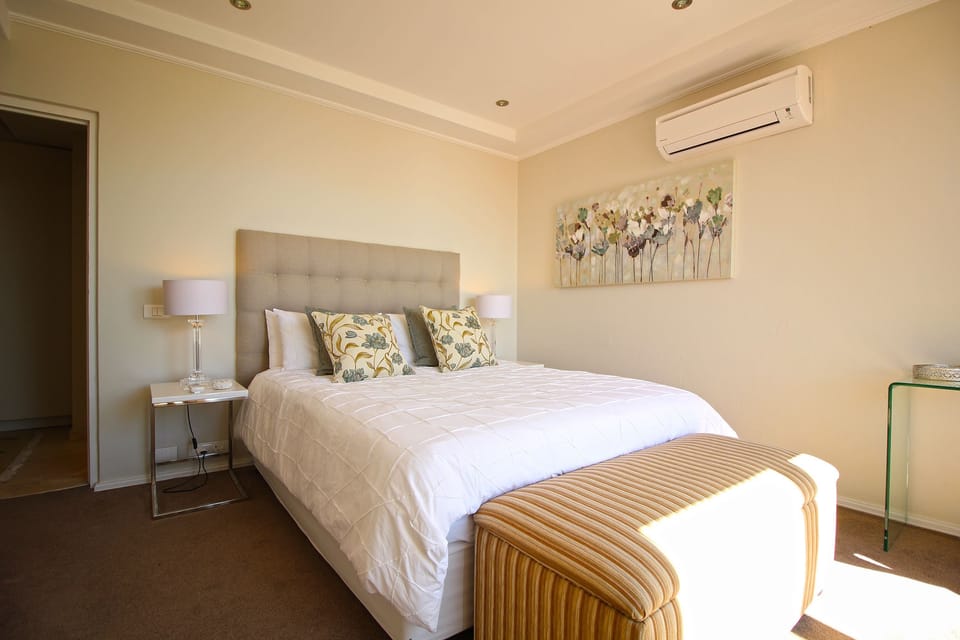 Premier Apartment, 2 Bedrooms, Balcony, Ocean View | 2 bedrooms, in-room safe, desk, iron/ironing board
