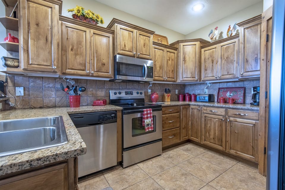 Kitchen with cookware, utensils, bakeware,dishes serving pieces small appliances