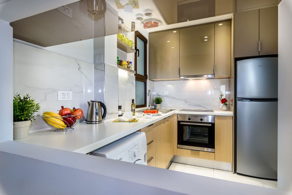 Apartment, 2 Bedrooms | Private kitchen | Full-size fridge, microwave, oven, stovetop