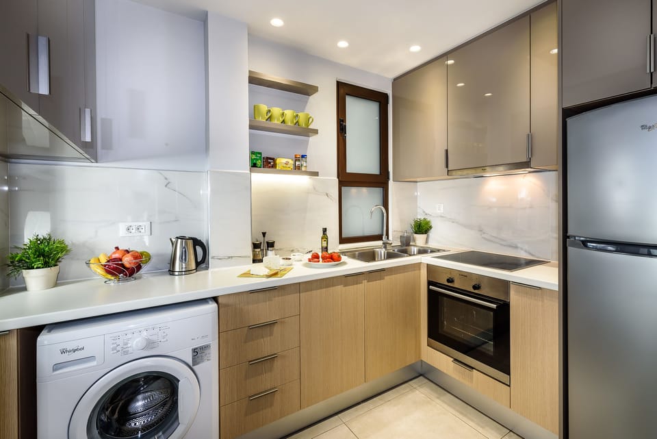 Apartment, 2 Bedrooms | Private kitchen | Full-size fridge, microwave, oven, stovetop