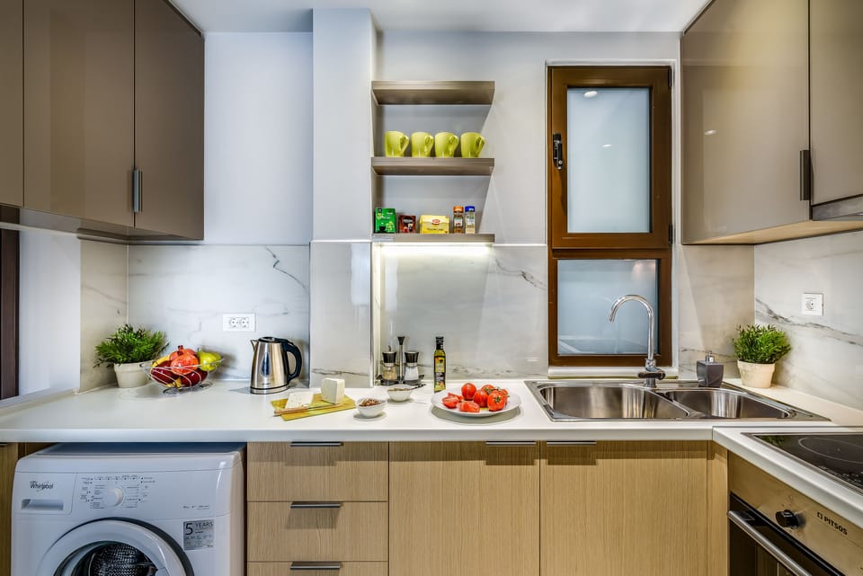 Apartment, 2 Bedrooms | Private kitchen | Full-size fridge, microwave, oven, stovetop