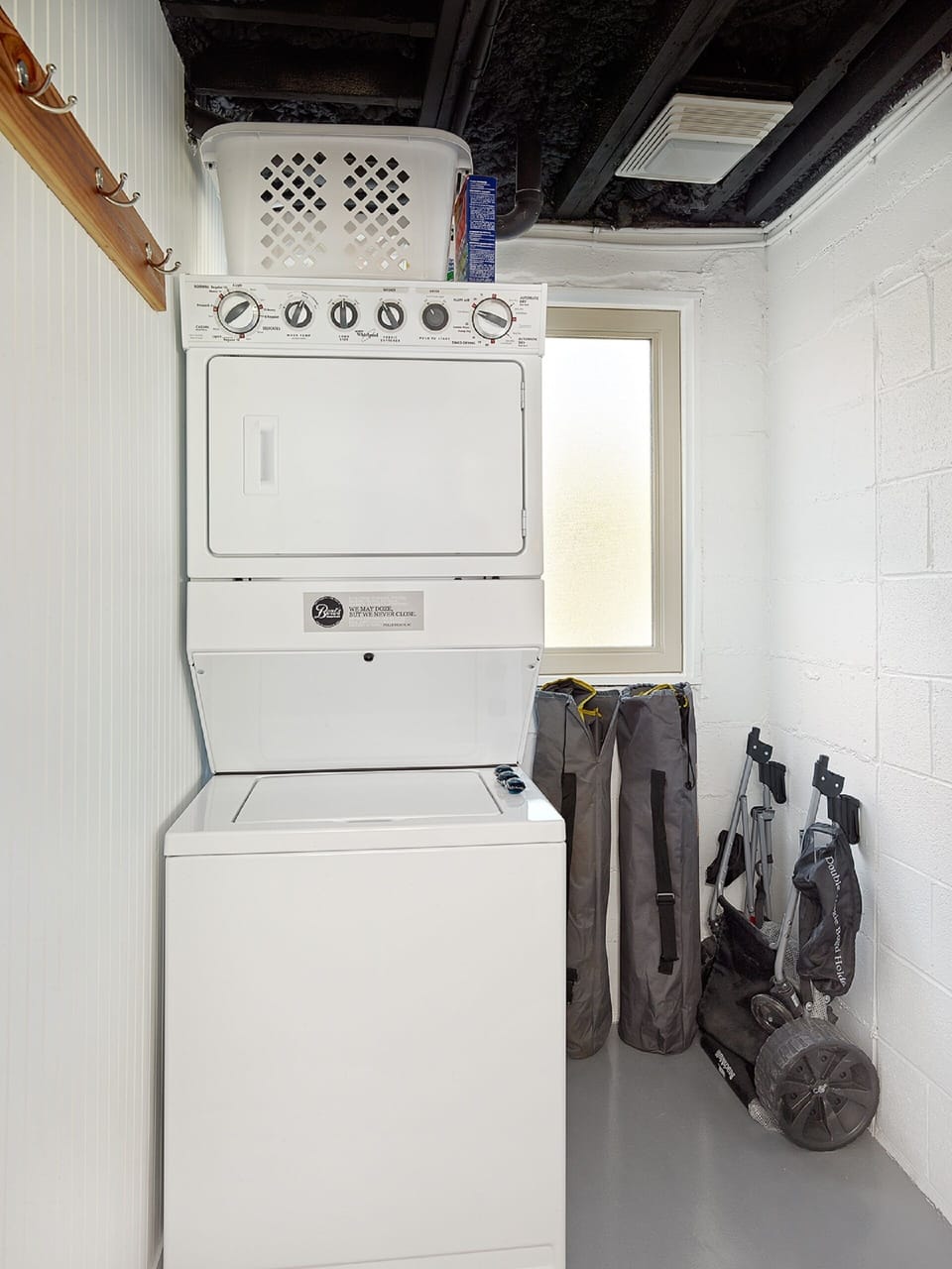 Laundry Room with washer/dryer, extra storage and beach cart and chairs.