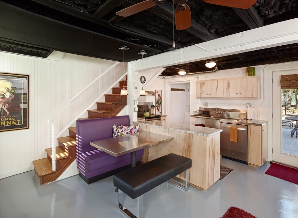 This home offers and industrial chic kitchen and dining area. Guests will have access to all cookware, dining and serving utensils and small appliances needed to prepare and serve meals.
