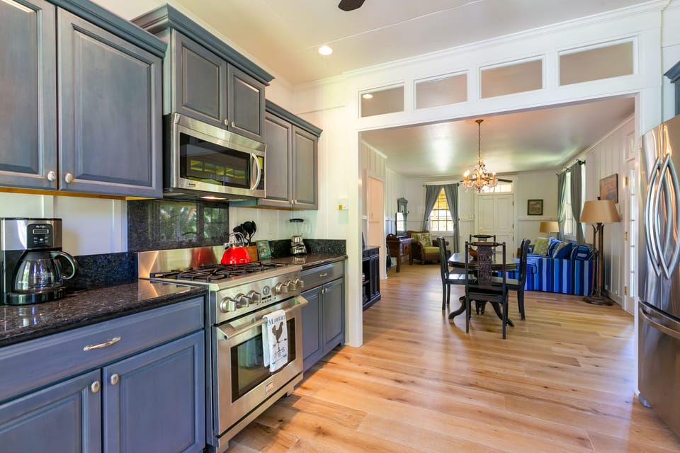 Kitchen looking into open dining and living area