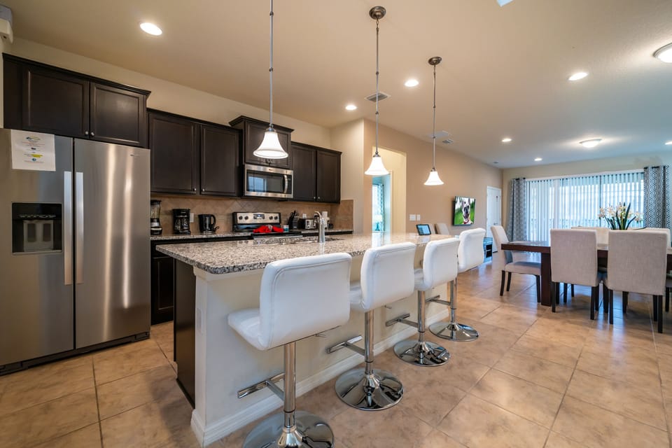 Kitchen showing breakfast bar with seating
