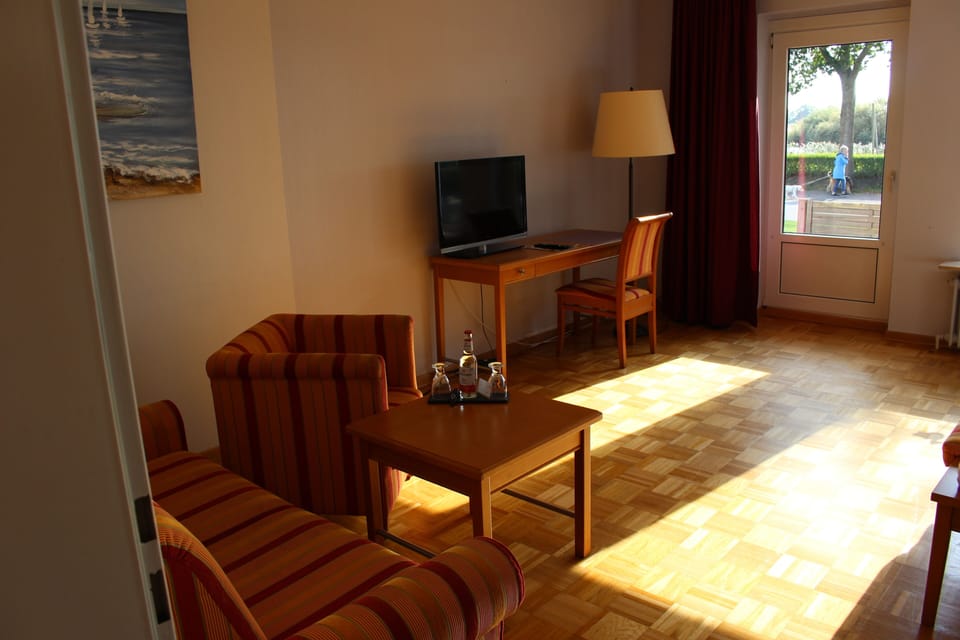 Apartment, 2 Bedrooms | Living area | 80-cm flat-screen TV with satellite channels, TV