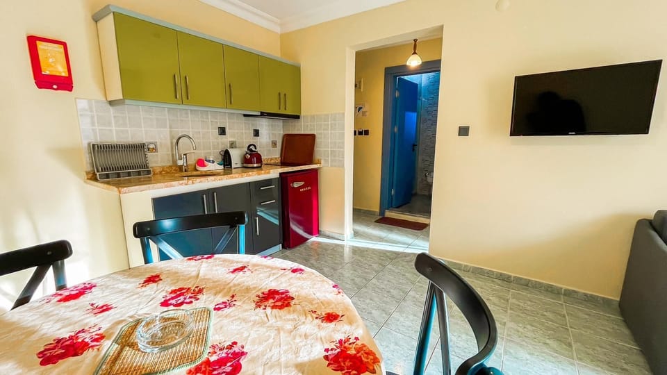 Apartment | Private kitchen | Fridge, electric kettle, cookware/dishes/utensils