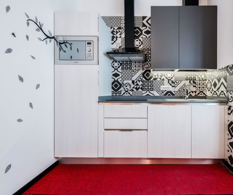 Full-size fridge, microwave, stovetop, espresso maker