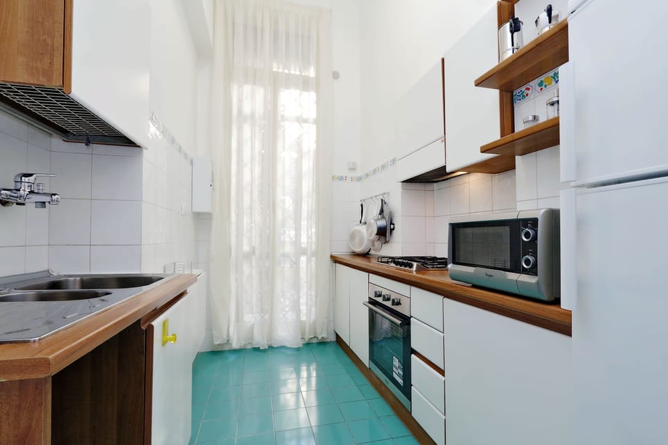 Apartment, 2 Bedrooms | Private kitchen | Full-size fridge, oven, stovetop, espresso maker