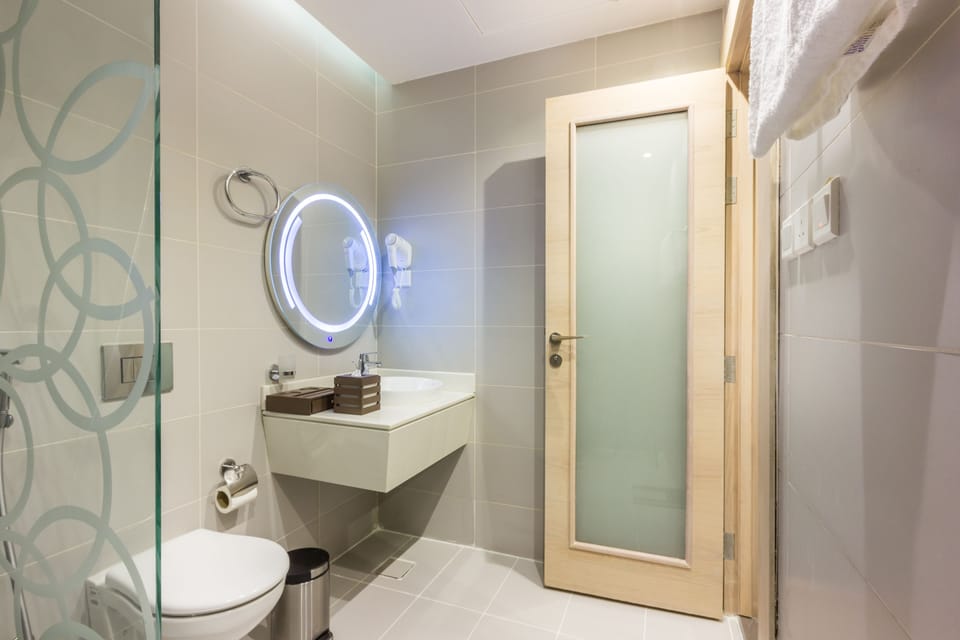 Shower, free toiletries, hair dryer, slippers