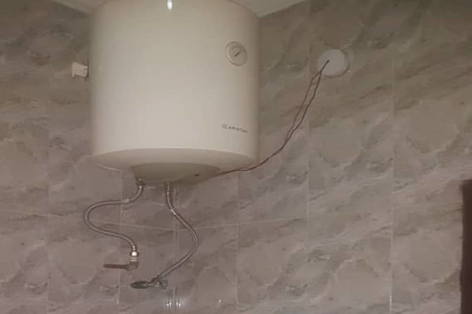 Luxury Room | Bathroom | Shower, towels