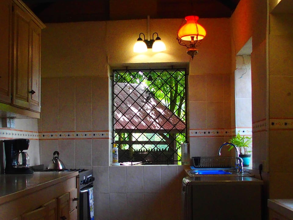 Far end of fully equipped kitchen