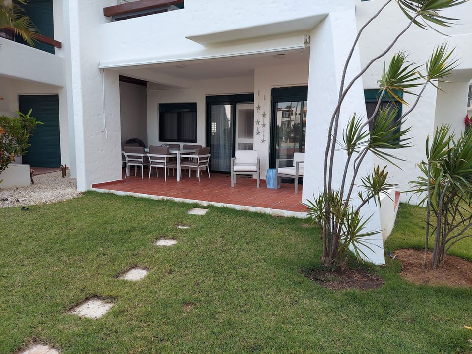Rollaway screen added to extended patio