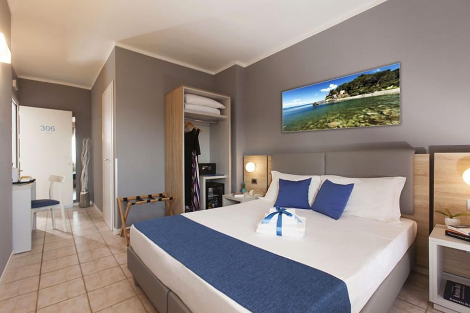 Panoramic Double or Twin Room, Partial Sea View | Premium bedding, down comforters, memory foam beds, minibar