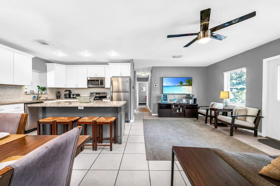 Enjoy 5 seating areas! 4 bar stools, dining for 6, 2 chairs, or 4 stools!