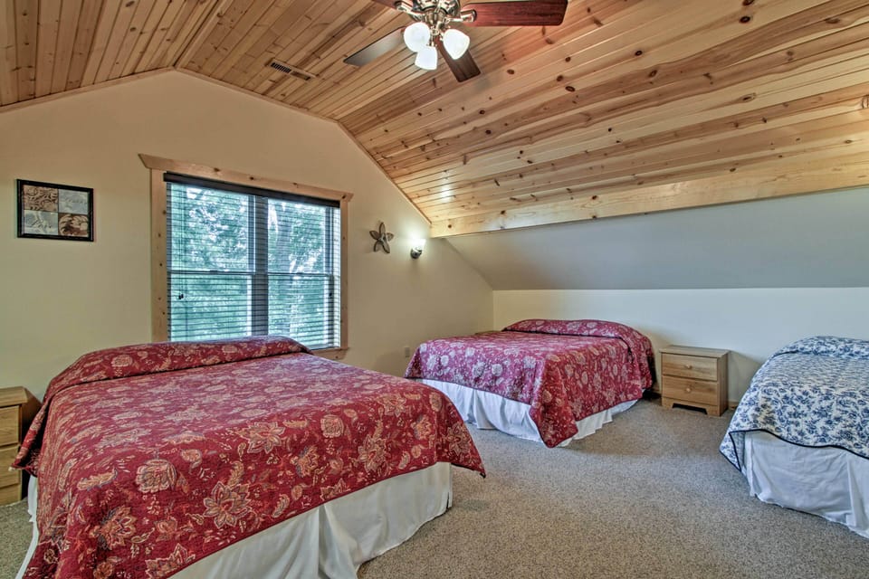 Bedroom #3 upstairs with 2 queen beds & 1 twin.