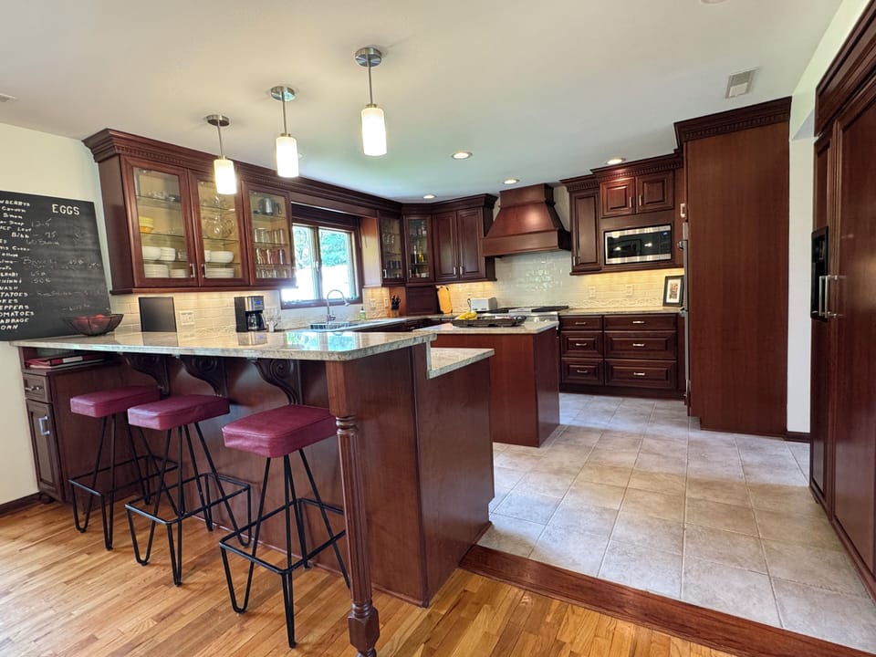 Take a seat at the bar or lend a hand in the large kitchen
