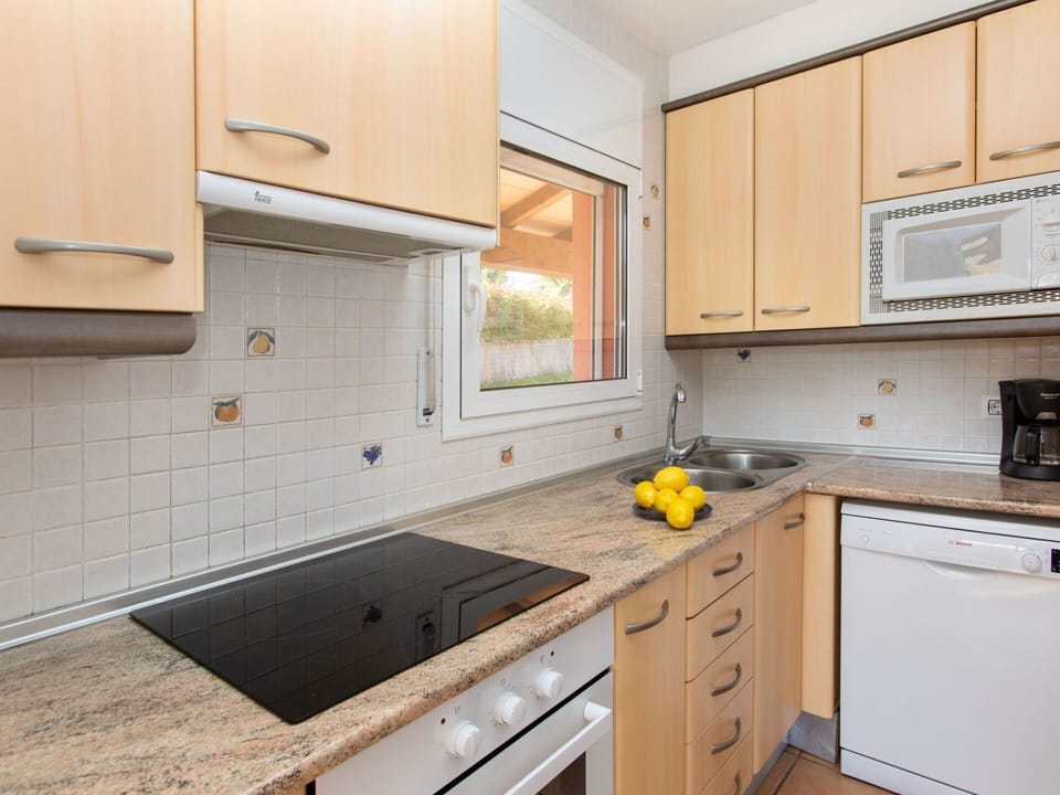 Countertop, Cabinetry, Property, Building, Kitchen Sink, Furniture, White, Kitchen Appliance, Kitchen, Kitchen Stove