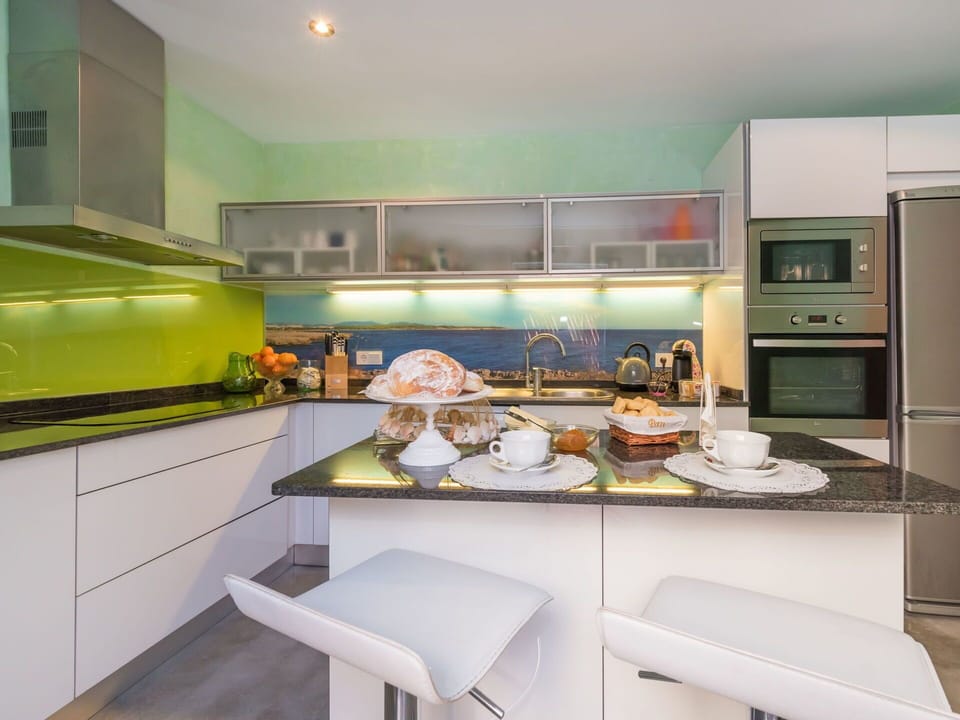 Countertop, Room, Kitchen, Cabinetry, Green, Furniture, Property, Interior Design, Yellow, Kitchen Stove