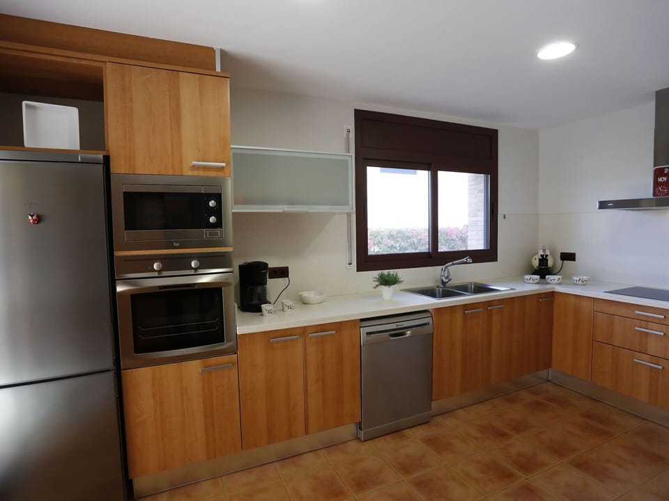 Cabinetry, Countertop, Room, Furniture, Kitchen, Property, Major Appliance, Hardwood, Building, Wood Flooring