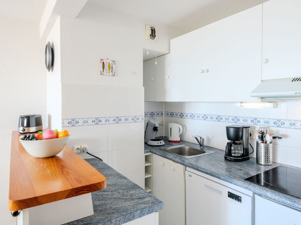 Kitchen, Countertop, Flooring, Interior Design, Furniture, Floor, Cabinetry, Major Appliance, Kitchen Appliance, Tap