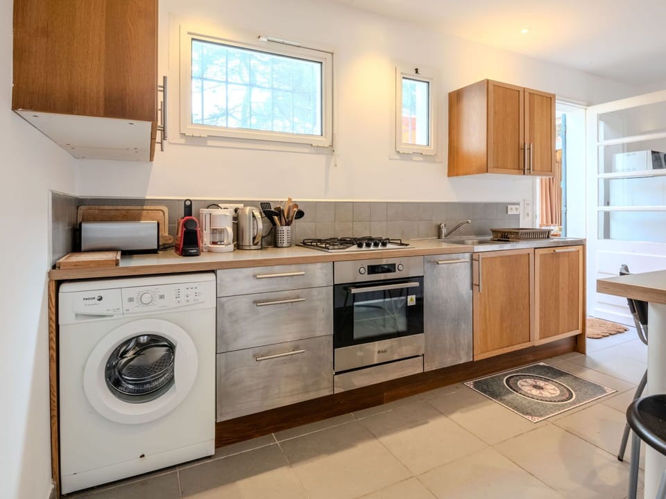 Kitchen Appliance, Kitchen, Countertop, Major Appliance, Cabinetry, Flooring, Furniture, Home Appliance, Wood, Interior Design