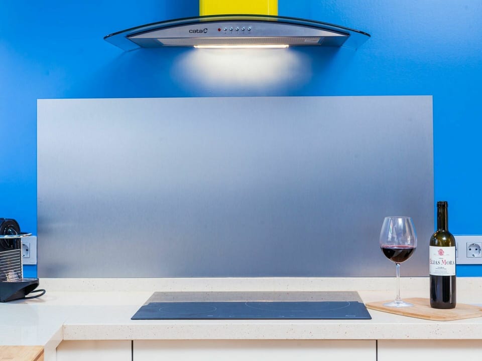 Blue, Furniture, Tableware, Bottle, White, Table, Light, Automotive Design, Wine Glass, Lighting
