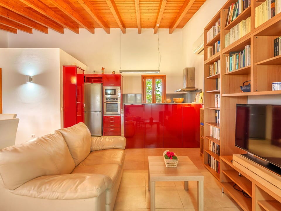 Property, Furniture, Cabinetry, Couch, Wood, Orange, Shelf, Interior Design, Architecture, Living Room