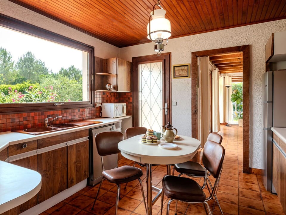 Furniture, Kitchen, Interior Design, Countertop, Wood, Flooring, Ceiling, Kitchen Appliance, Cabinetry, Lighting