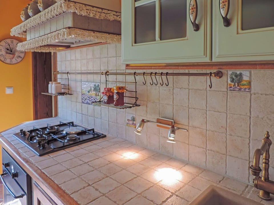 Countertop, Tile, Property, Kitchen, Room, Cabinetry, Floor, Furniture, Interior Design, Real Estate