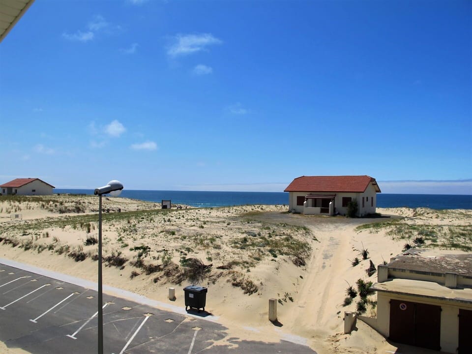 Sky, Property, Vacation, Sea, Sand, Coast, Beach, House, Tourism, Architecture