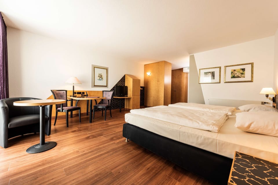 Junior Suite | Premium bedding, minibar, in-room safe, desk