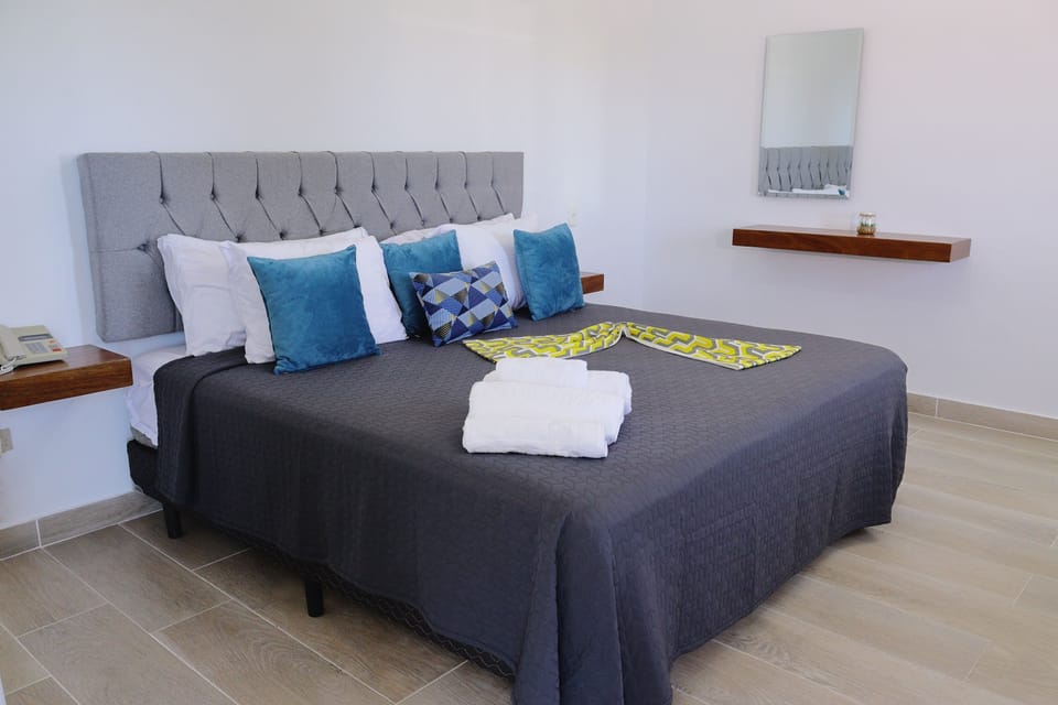 Superior Double Room | Minibar, in-room safe, individually furnished, iron/ironing board