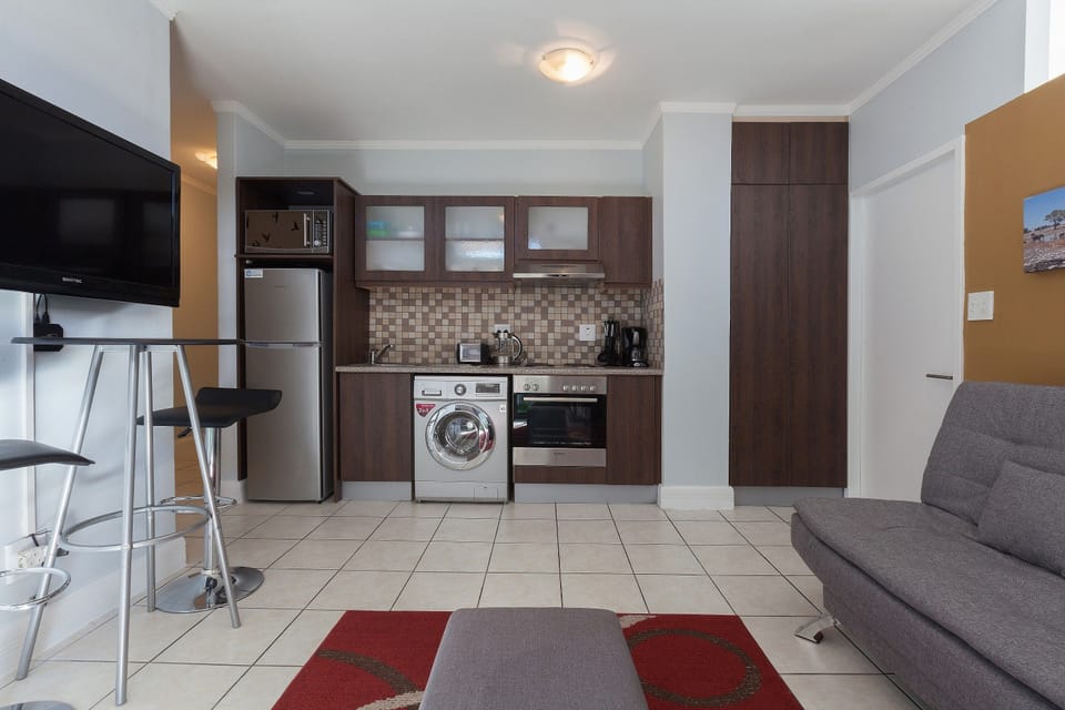 Apartment (2 Bedrooms) | Living room | Flat-screen TV