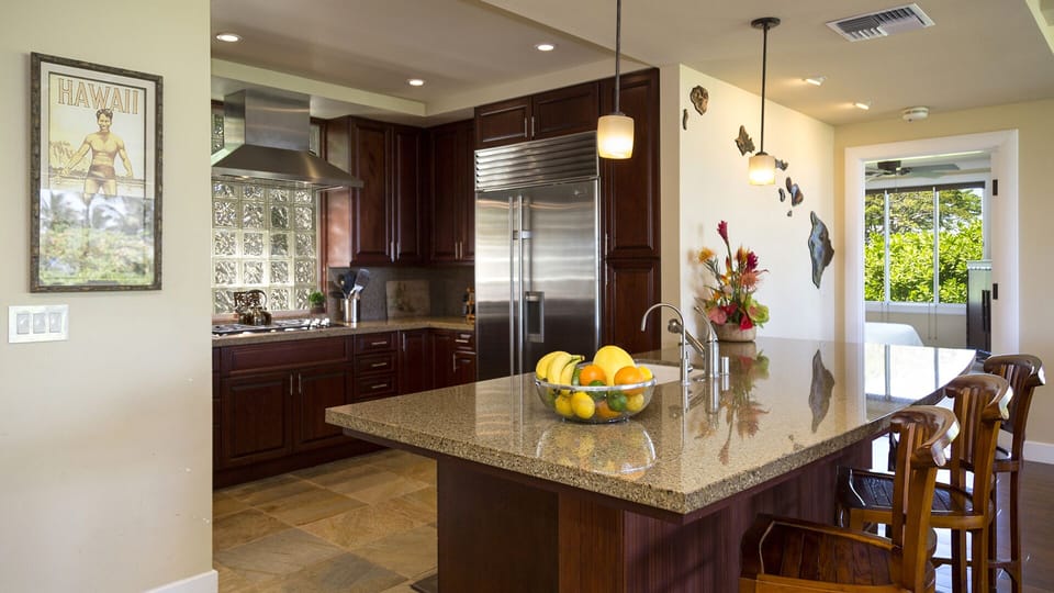 Gourmet Kitchen with Bar Area & Granite Countertops