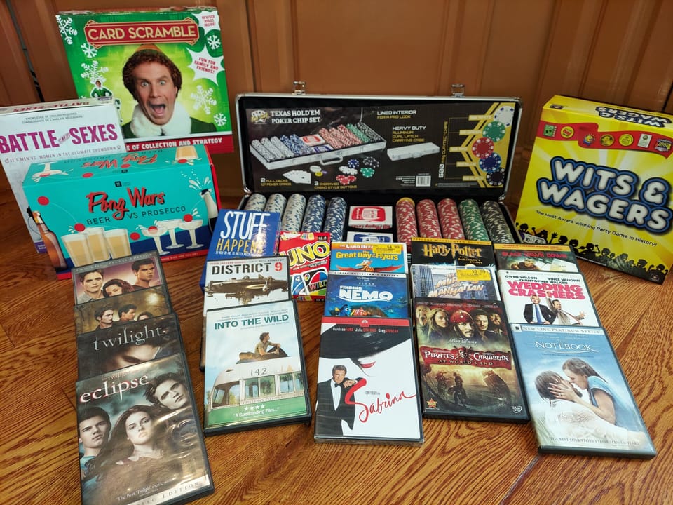 POKERS CIPS & CARDS, WITS & WAGERS, DVD'S AND MORE GAMES. 
CORN HOLE OUTSIDE.